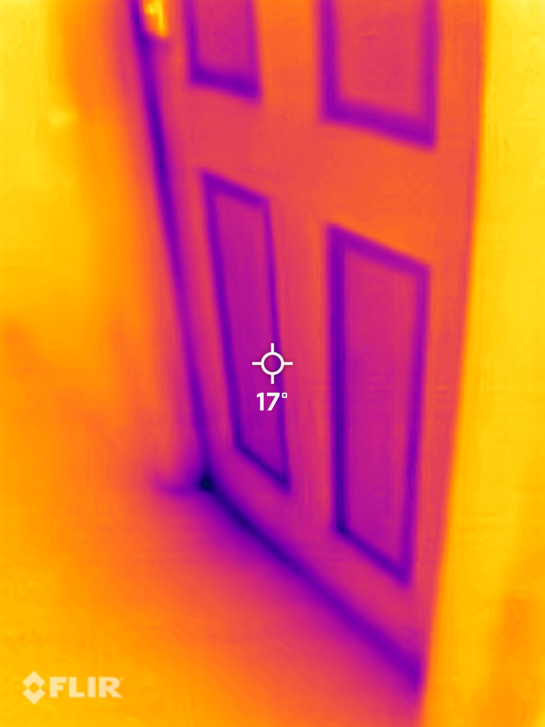 Thermal image of an external door showing high heat losses